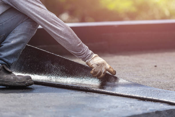 Professional Interior Drainage System technician working in Woodmere, NY